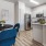 a kitchen with a table and chairs