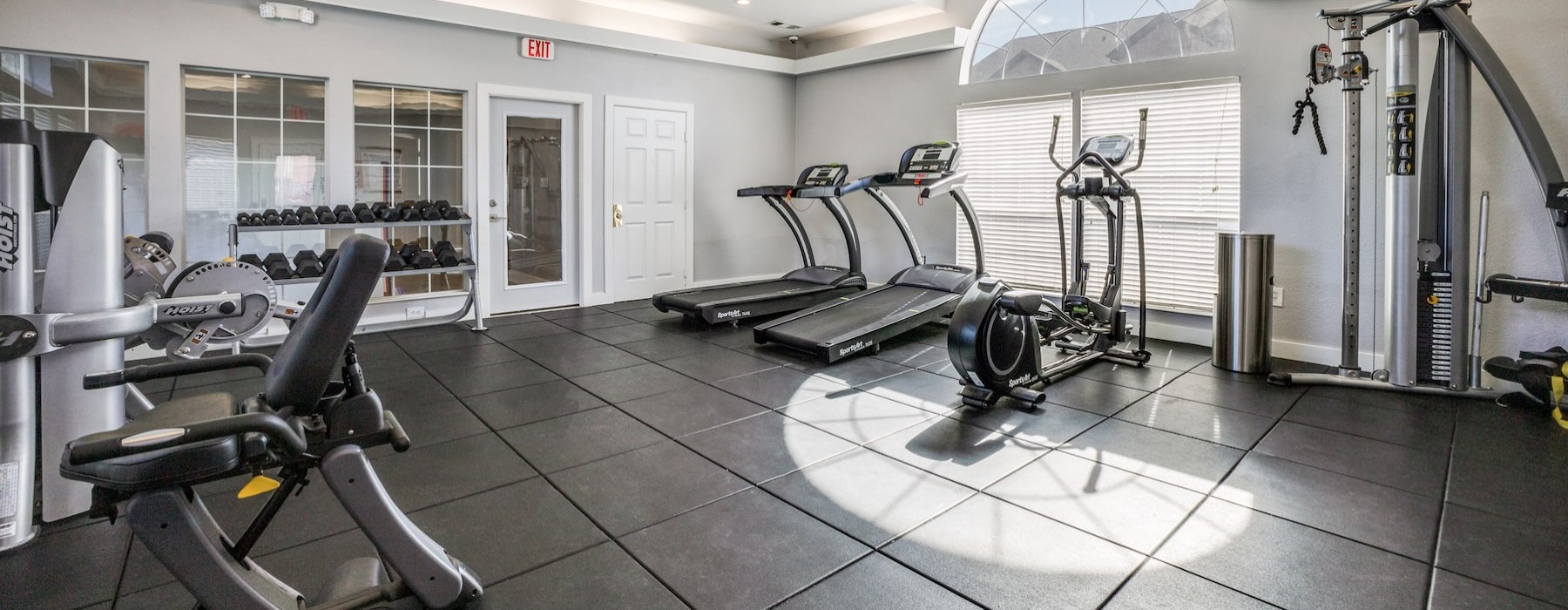 a gym with treadmills