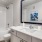 a bathroom with a large mirror