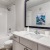 a bathroom with a large mirror