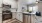 a kitchen with white cabinets