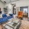 a living room with a blue couch