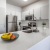 a kitchen with white cabinets